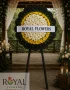 Canlı sarı ve beyaz gerbera çiçekleriyle hazırlanmış cenaze çelenk
