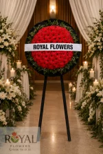 Yapay kırmızı gerbera çiçekleriyle hazırlanmış cenaze çelenk