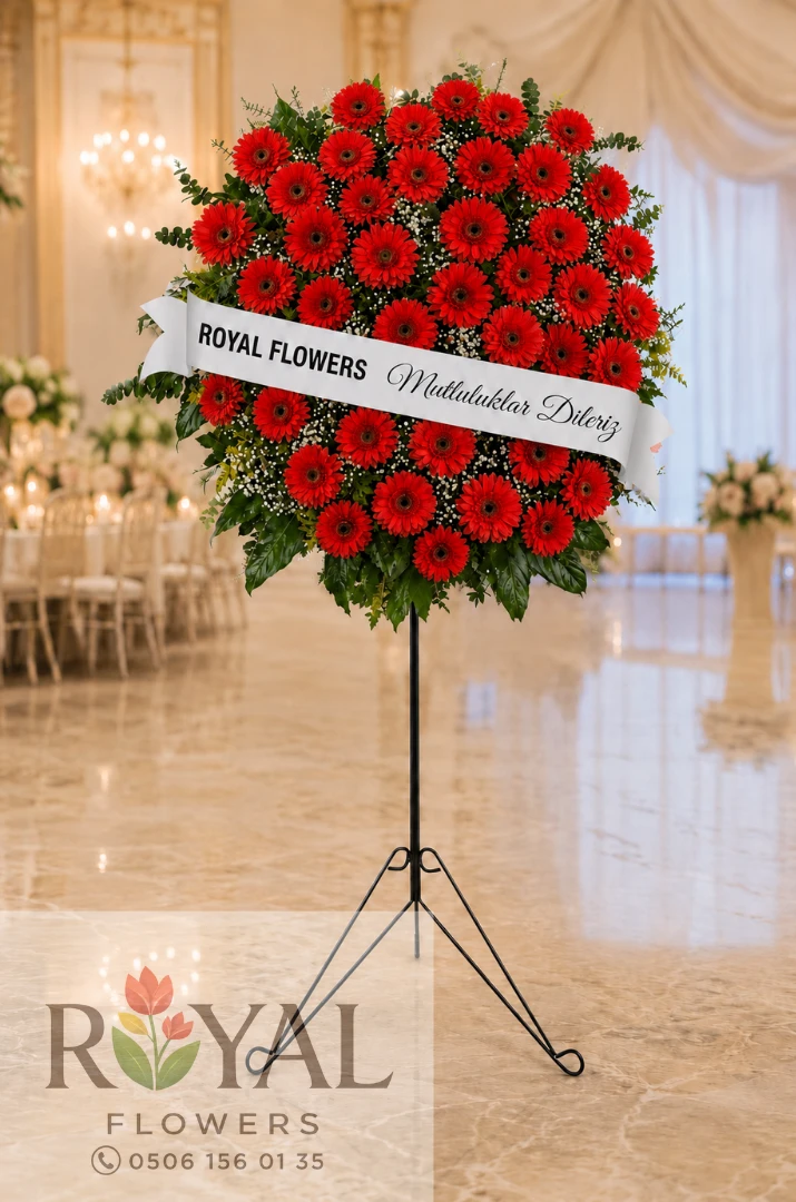 canli-kirmizi-gerbera-ferforje-celenk.webp Canlı kırmızı gerberalarla hazırlanan ferforje açılış ve düğün çelenk